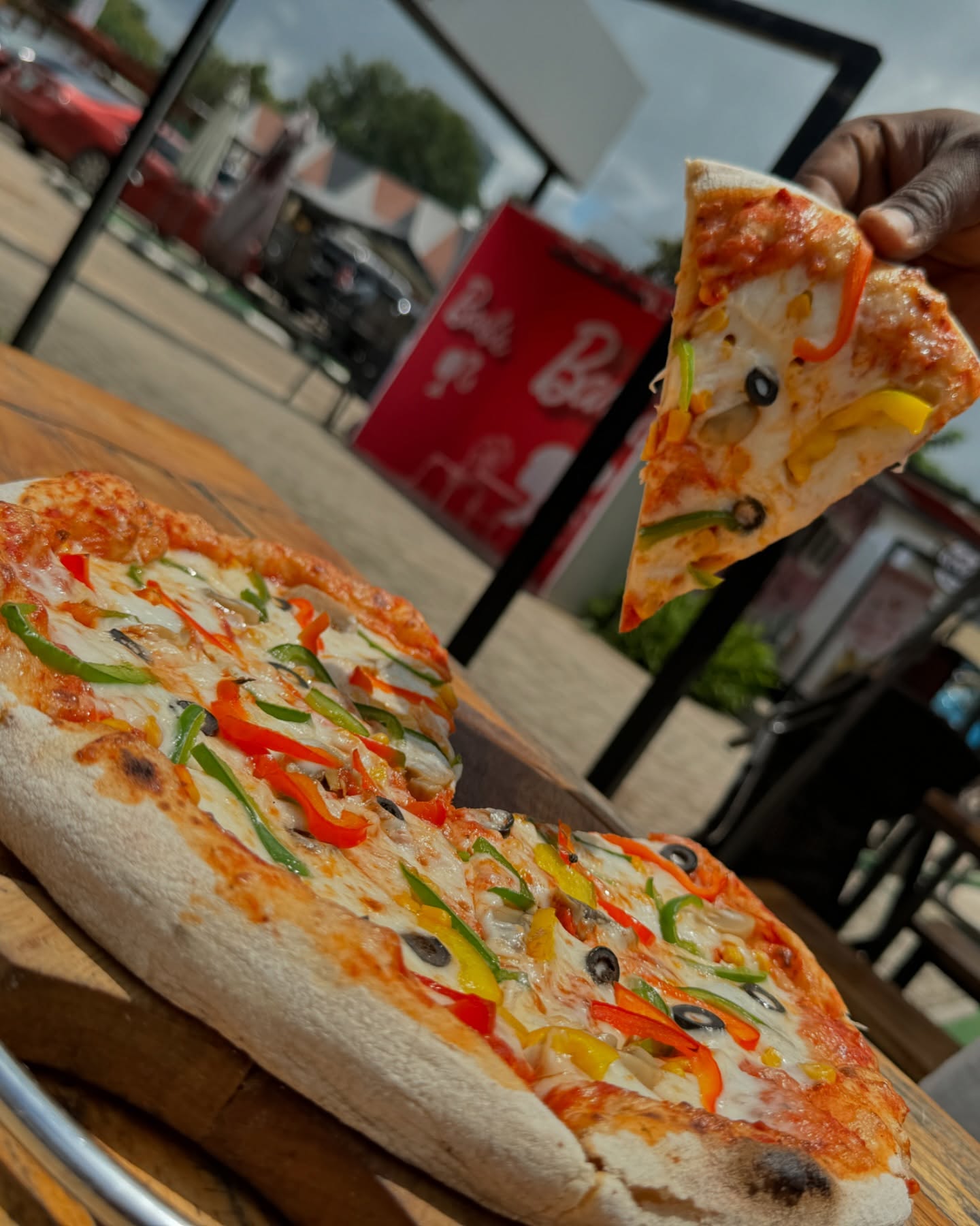 Pizzeria in Abuja with customers