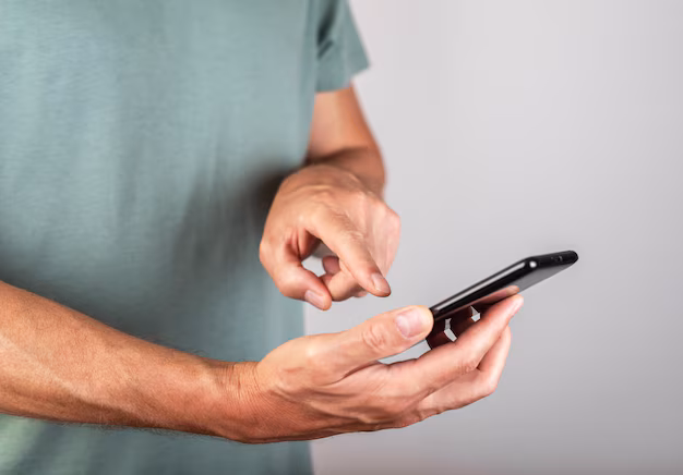 User tapping call button on phone